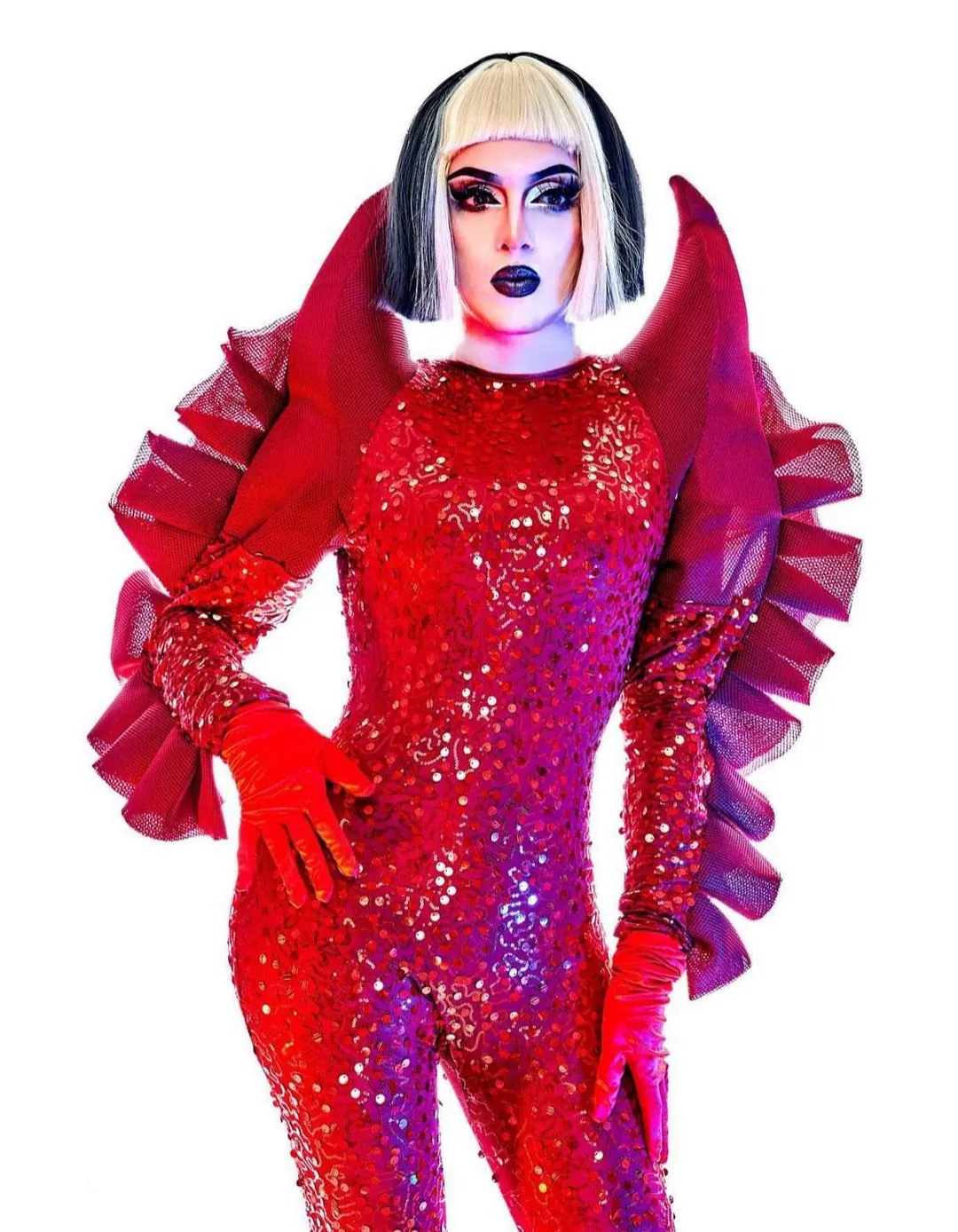 Red sequin catsuit with red tulle ruffle wings on a white background